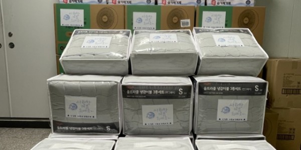 10. 신갈동 지역사회보장협의체가 4일 관내 주거 취약가구에 선풍기, 여름침구세트, 제습제 등 여름용품을 지원했다..jpg