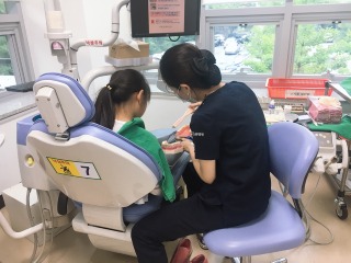 수원병원)치과주치의사업+진료+사진.jpeg